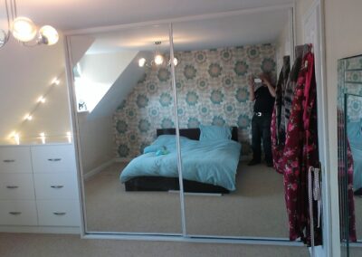 drawers and wardrobe with mirror sliding doors when finished