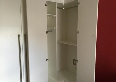 extra bedroom storage space - corner wardrobe