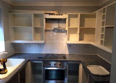 Getting cupboards ready for fully fitted kitchen