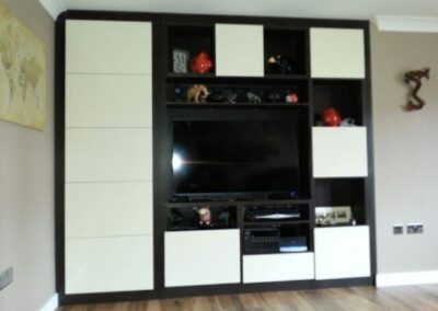 Finished TV Unit With Storage Under Stairs