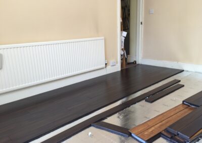 Cost effective laminate flooring installation job starts