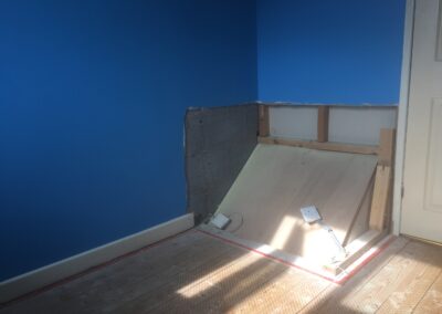 room ready for high sleeper bed with stairs bulkhead showing
