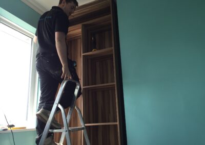 work underway building a fitted wardrobe in an alcove