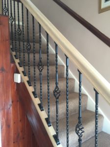 side view of new staircase with rail and spindles