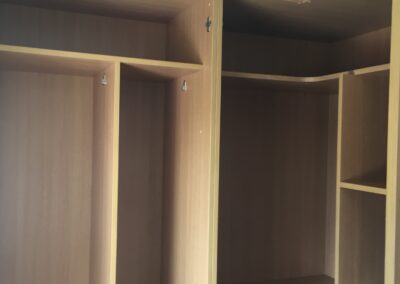 wardrobe fitting into place