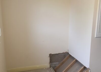 stairs bulkhead exposed in bedroom alcove