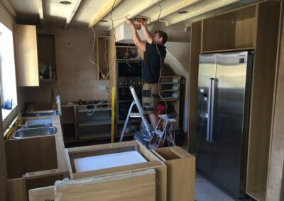 elrctrician-at-work-in-new-kitchen