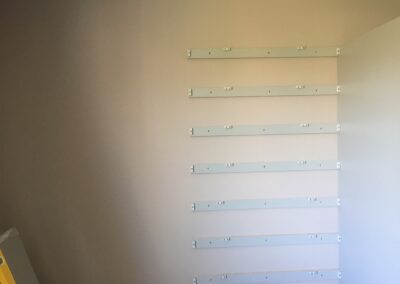 blank wall ready for Sliding Wardrobes With Matching Dressing Table And Bedside Drawers
