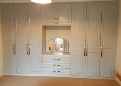 final view of built in wardrobes with dressing table and internal drawers