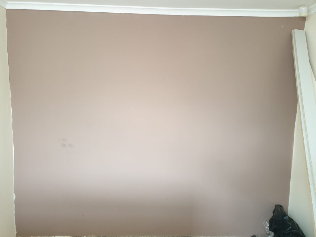 Blank wall for three double wardrobes