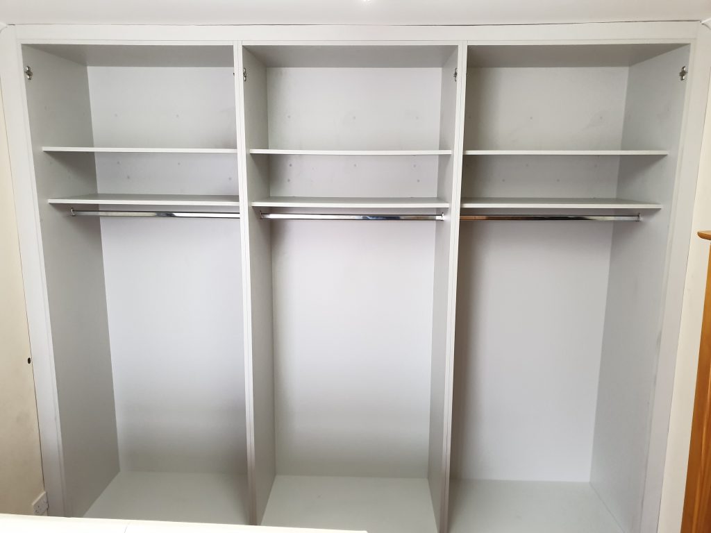 Three double wardrobes in build with shelves and hanging rail