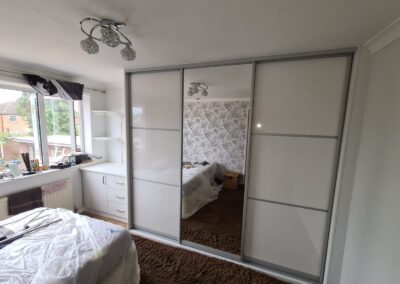 finished fitted wardrobe with desktop