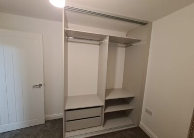double wardrobe with drawers in-build