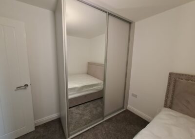 glass sliders and double wardrobe