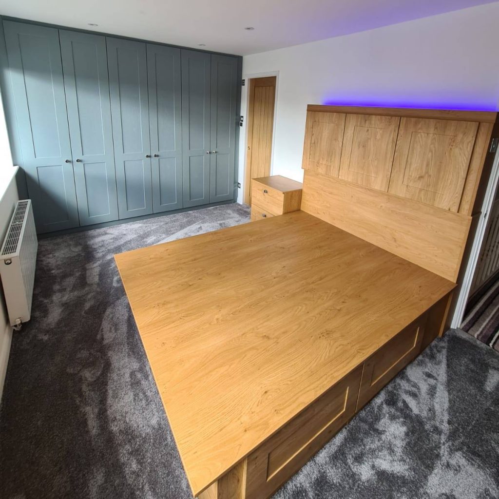 bespoke bedroom with green wardrobes