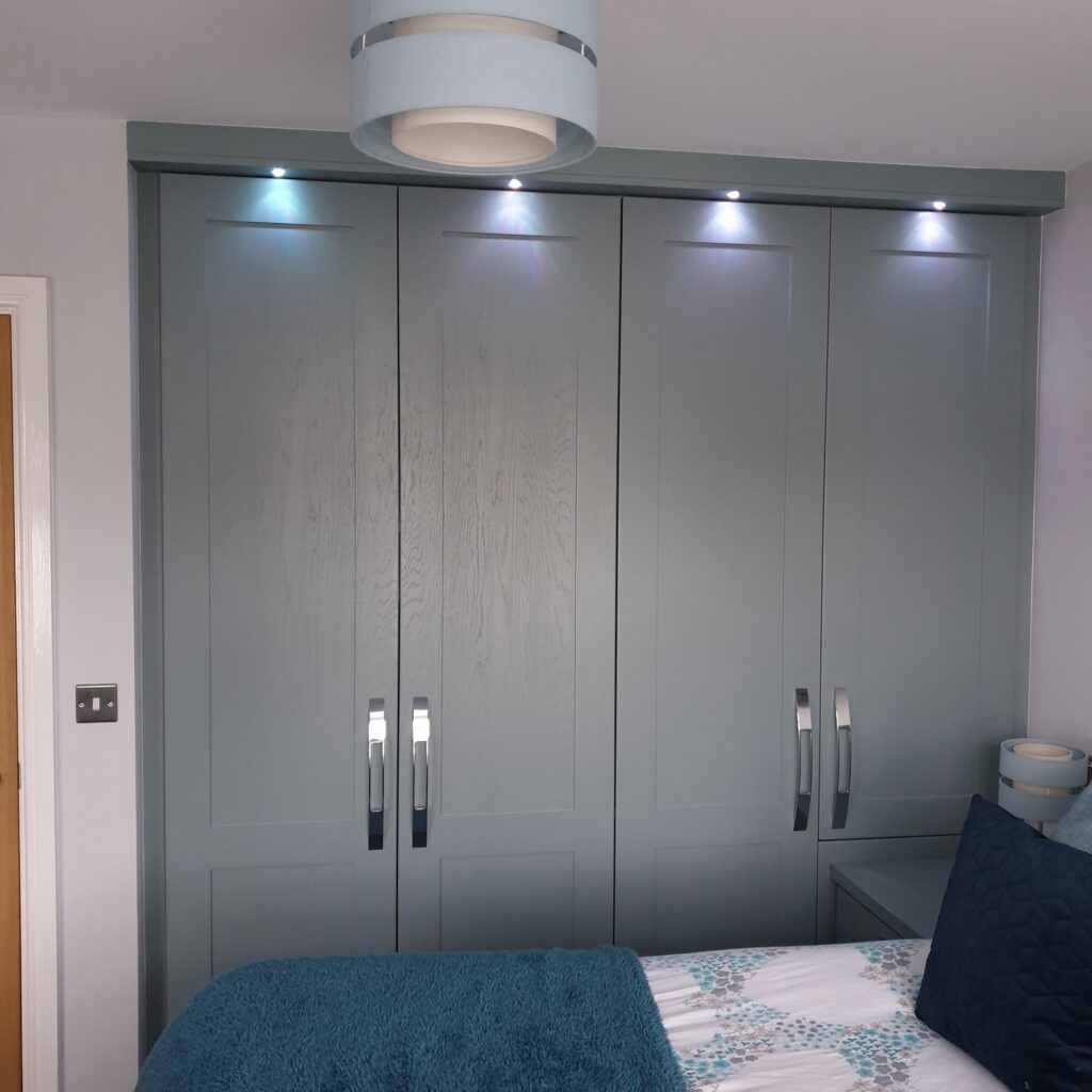 light grey wardrobe with downlights